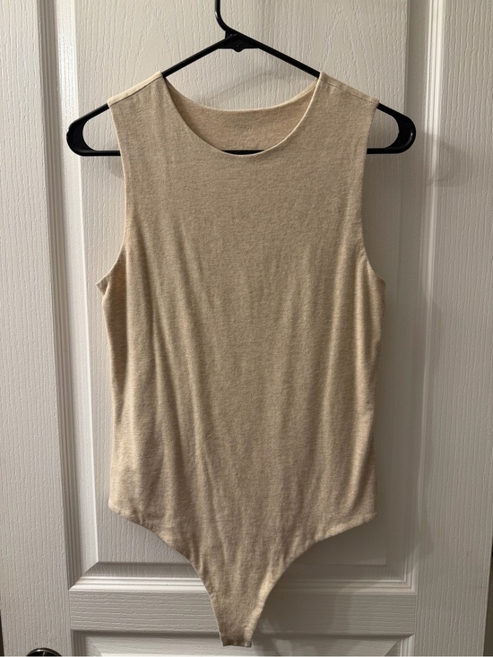 nuuds Tops - nuuds Sleeveless Cream Bodysuit